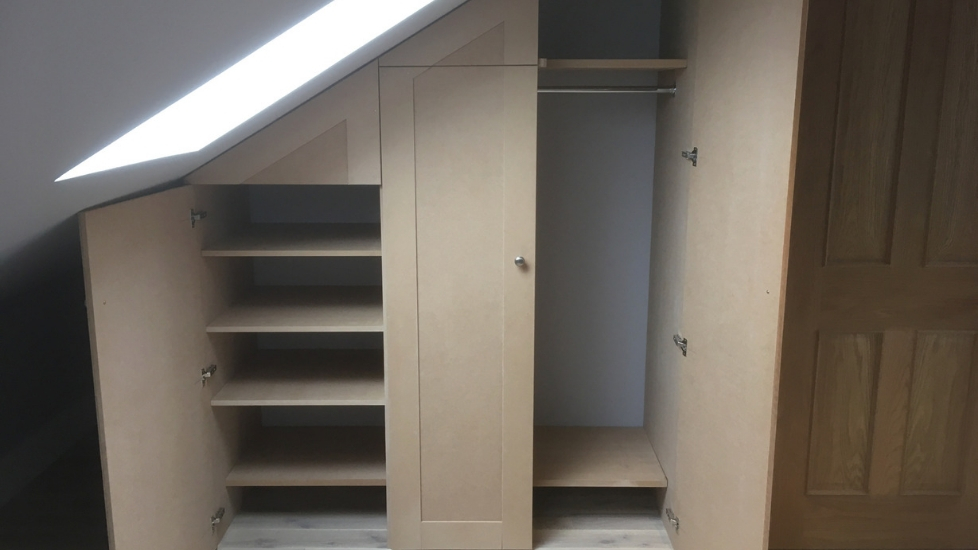 Loft under-eaves fitted wardrobe